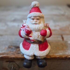 Kerstman met " Bungelbeentjes" Keramiek